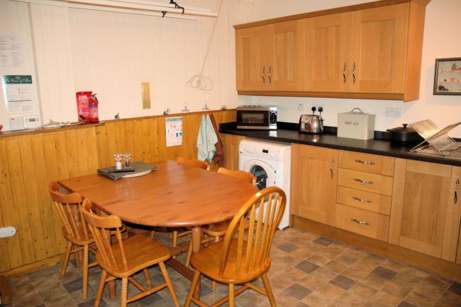 The kitchen in Bruaich Cottage has recently been re-fitted to a high standard with modern kitchen units and appliances.